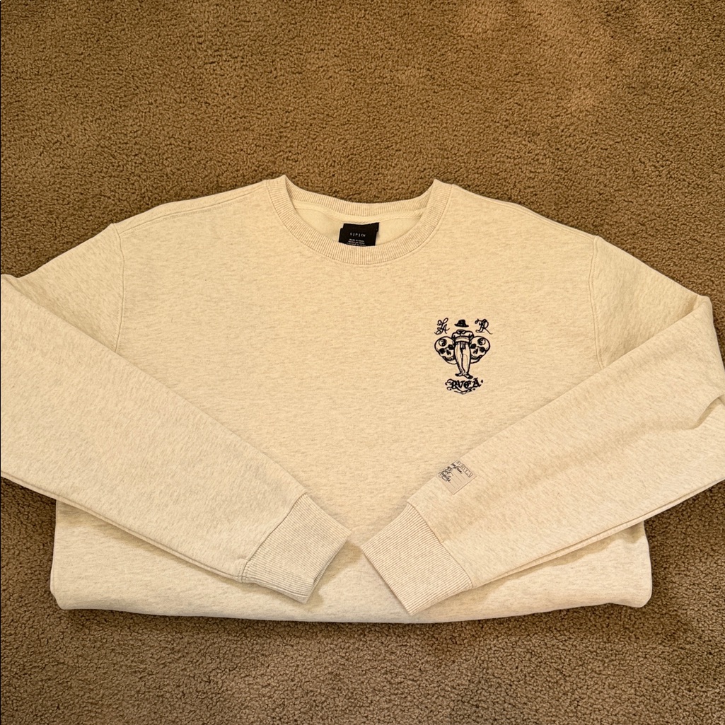 Rvca Cream Sweatshirt With Black Skull Graphic